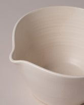 Closeup detail of the Eric Bonnin Off-White Kam Bowl #1 on light color background.