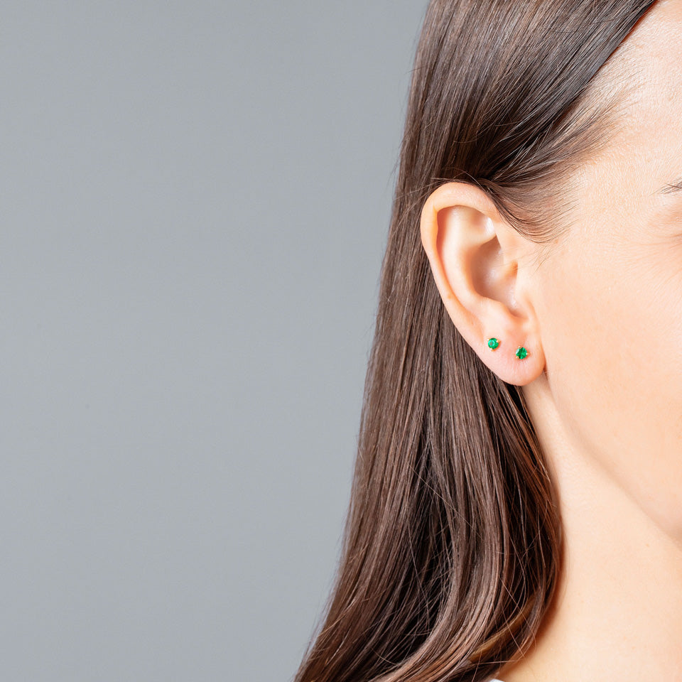product_details::Martini Studs - Emerald on model.