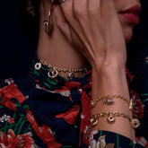 product_details::Salted Pretzel Charm Bracelet on model.